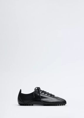 Leather sneakers with stitched sole